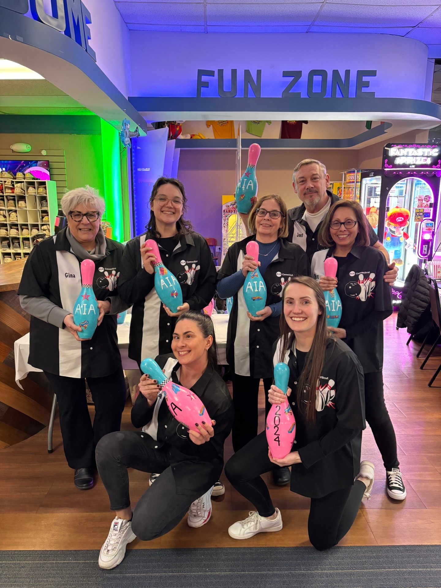 Bowling team with custom pins at Lakewood Lanes